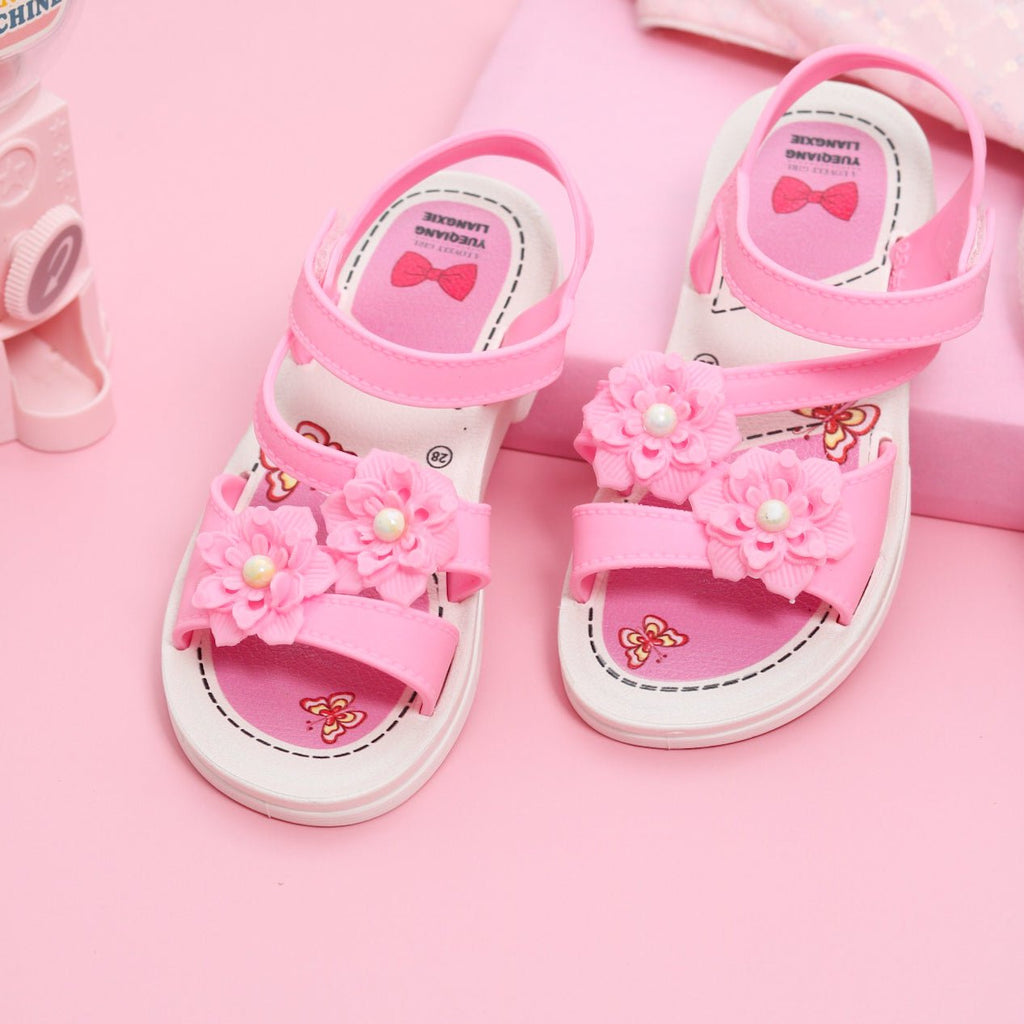 Toddler's pink sandals with flower embellishments and bow insole design