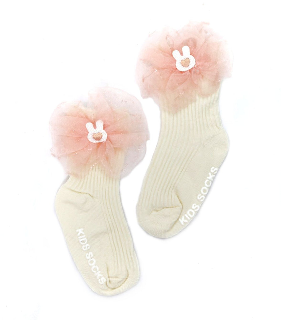 Pair of children's bow detailed socks in peach with whimsical tulle bows