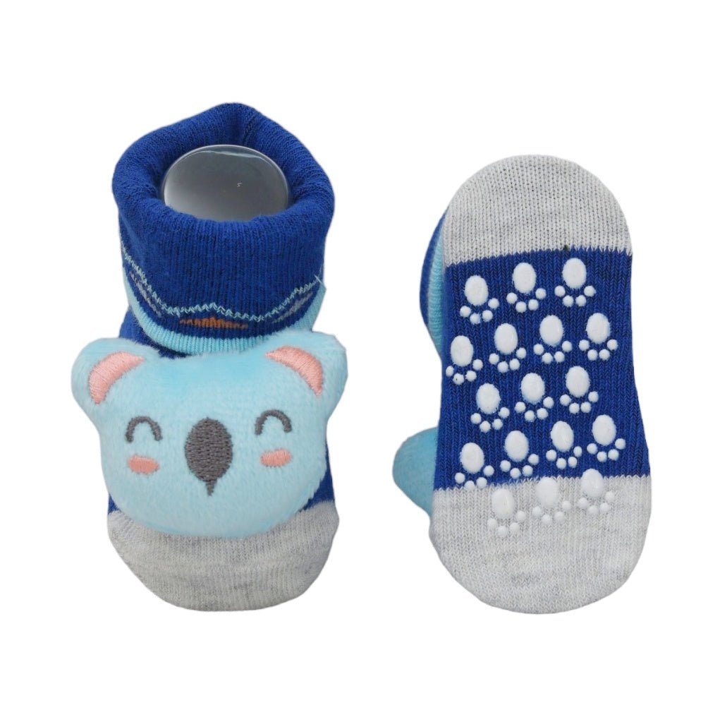 Anti-slip sole detail on baby girl's cupcake themed socks