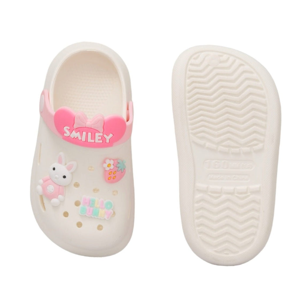 Beige and pink bunny-themed clogs showing top and sole view