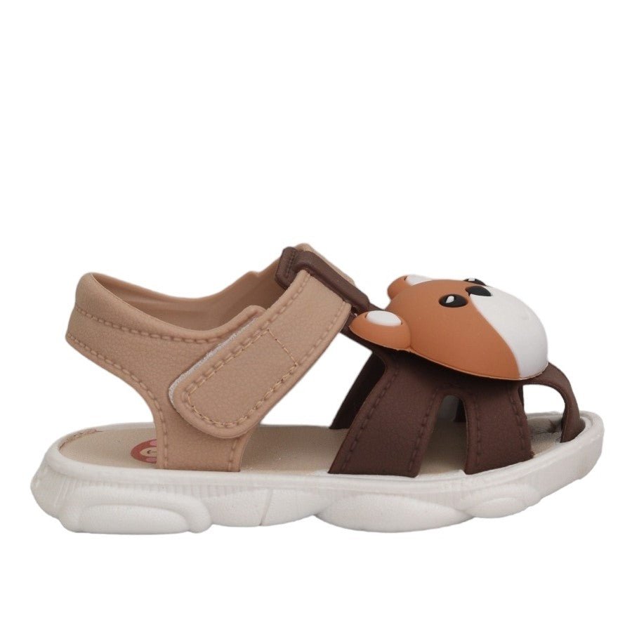 Durable sole of toddler brown bear sandals with playful paw print design
