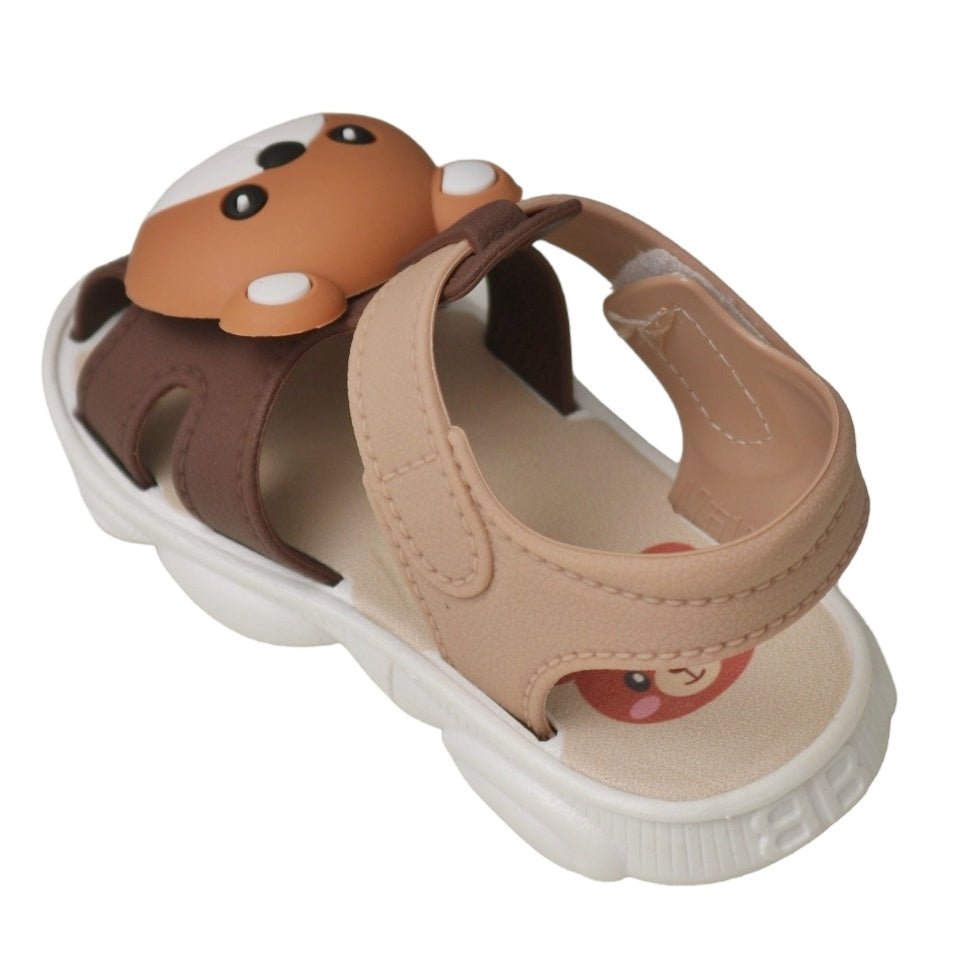 Toddler's brown bear sandals showcasing the bear head design and adjustable straps.
