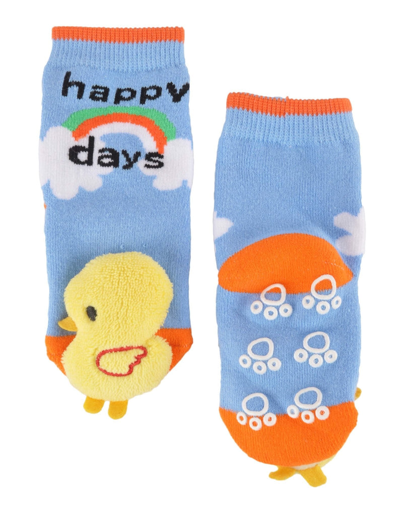 Child's blue plush socks with yellow duck design, showing anti-slip dots on the sole, top view.