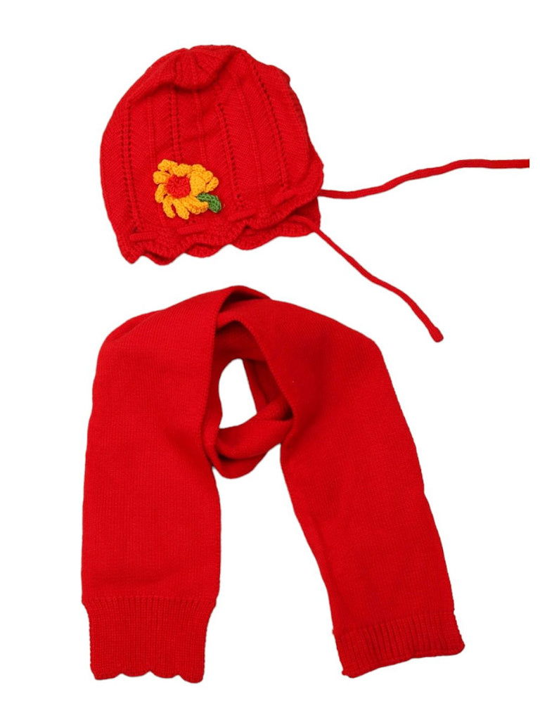 Complete set of girl's red knitted wool beanie with flower design and matching muffler.