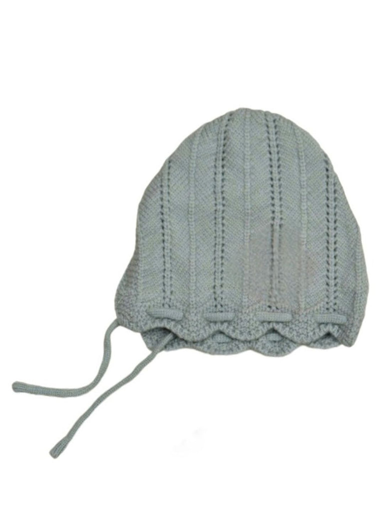 Girl's grey knitted muffler with ribbed ends laid out