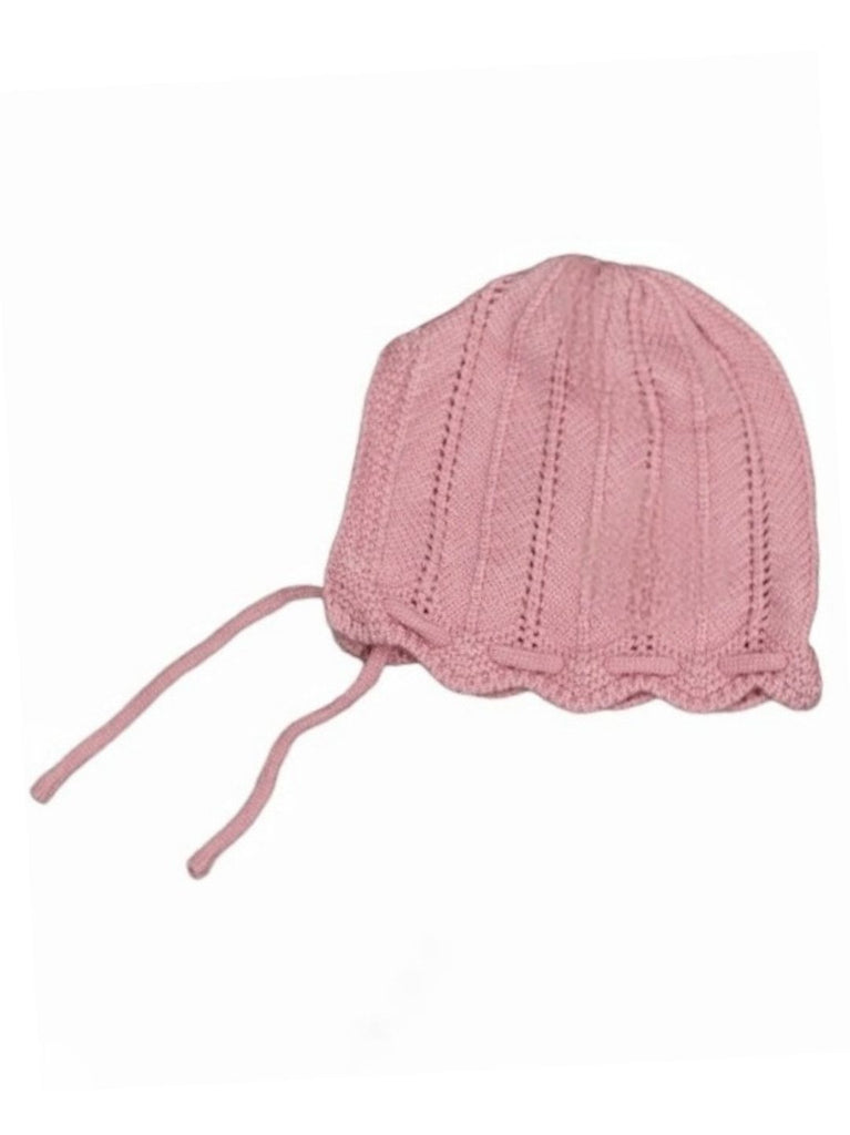 Detail of the floral applique on girls' pink knit winter hat