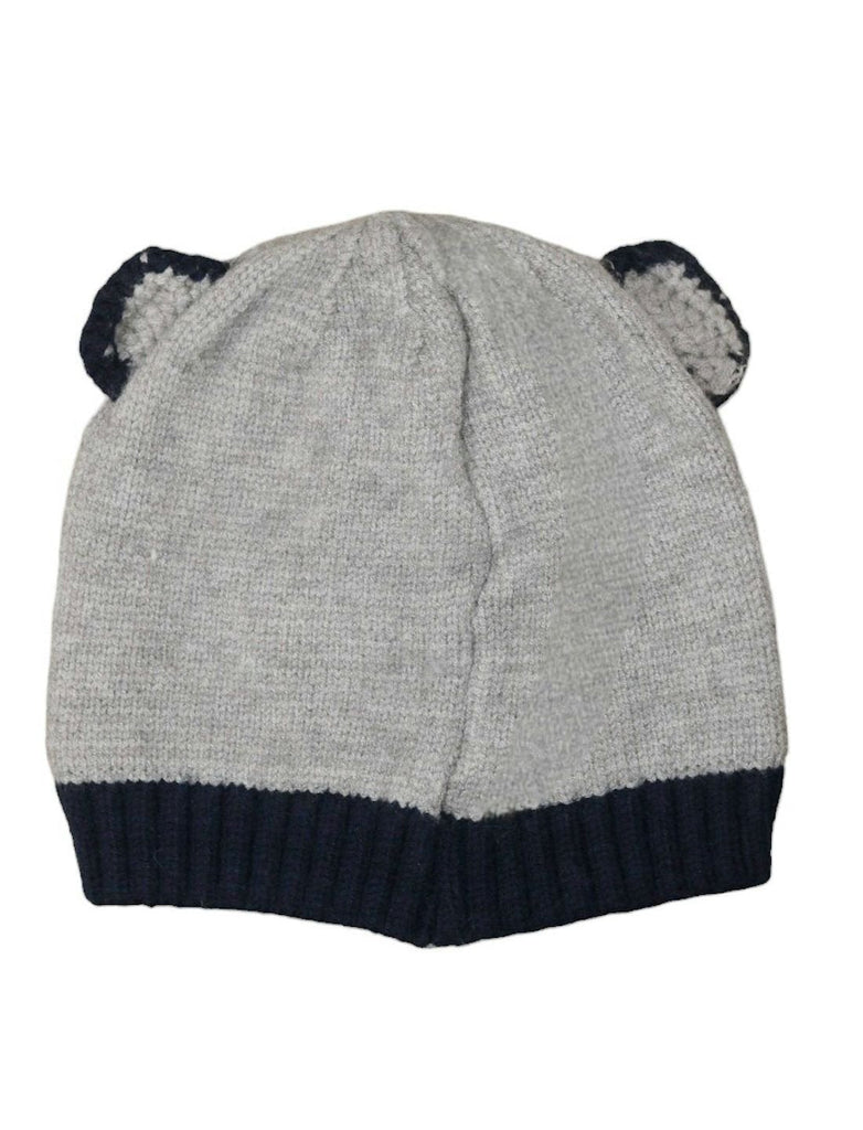 White knitted bear beanie for boys on a white stand.