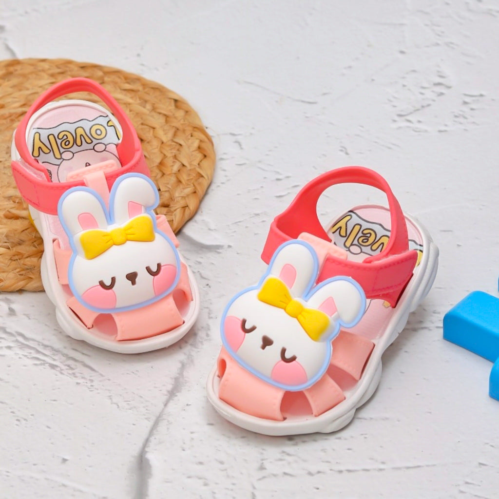 Charming peach-colored bunny applique sandals for children with a playful design