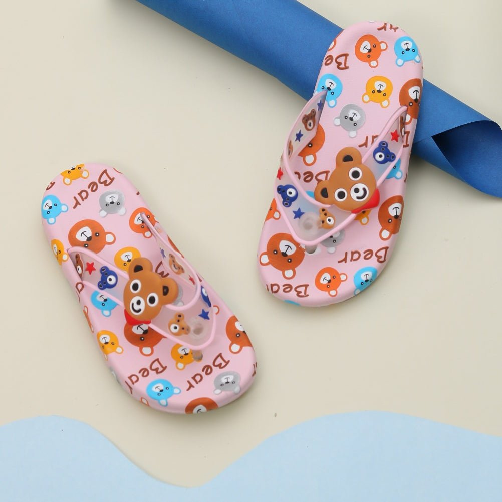 Kid-friendly pink flip flops with adorable bear pattern and soft thong strap