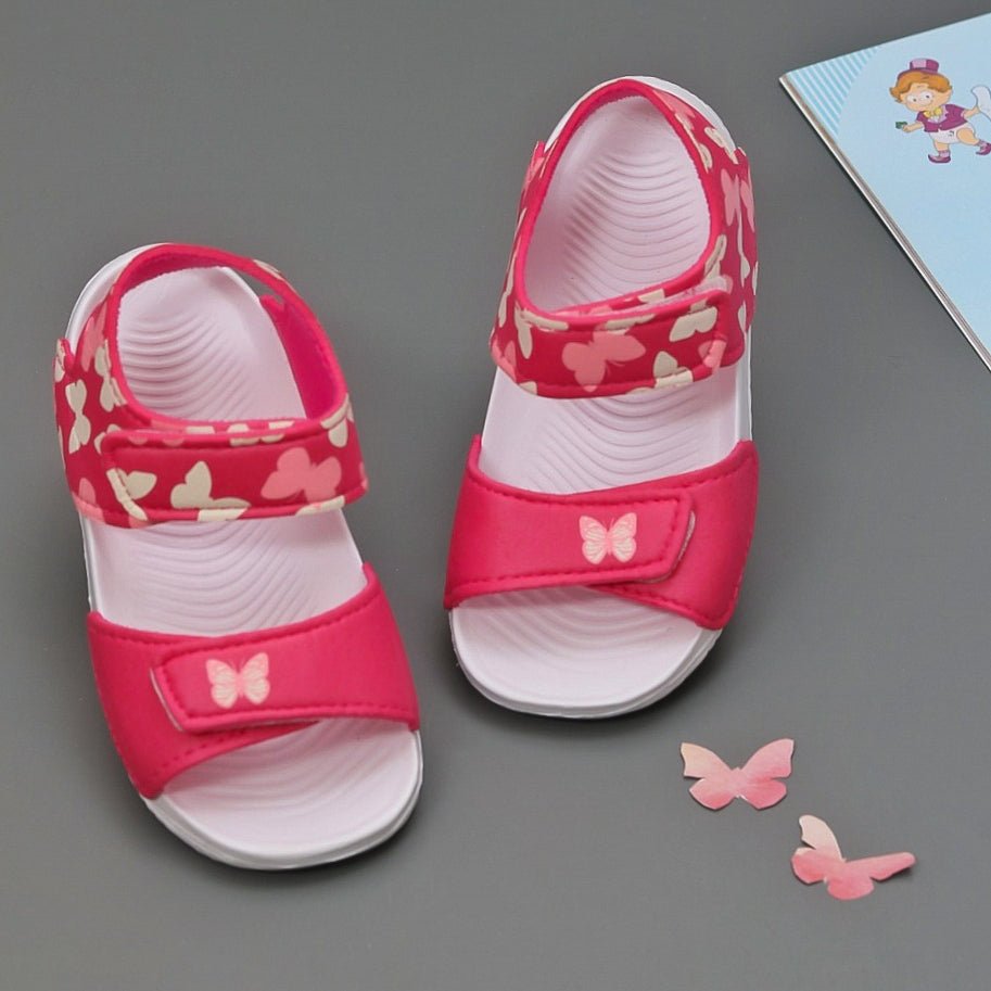 Toddler's Pink Butterfly Print Sandals with comfortable straps on a neutral background.