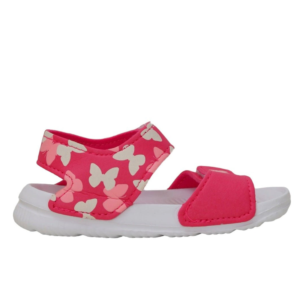 Side view of pink butterfly sandals showing the strap detail and print pattern.