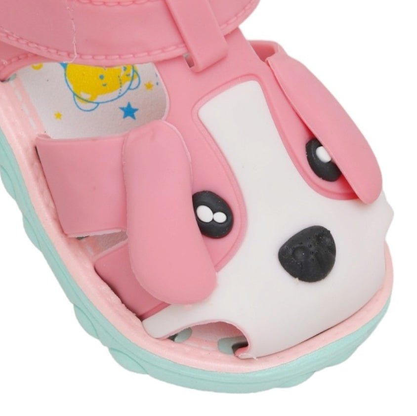  Close-up of the pink puppy applique on toddler sandals, focusing on the adorable face and straps.