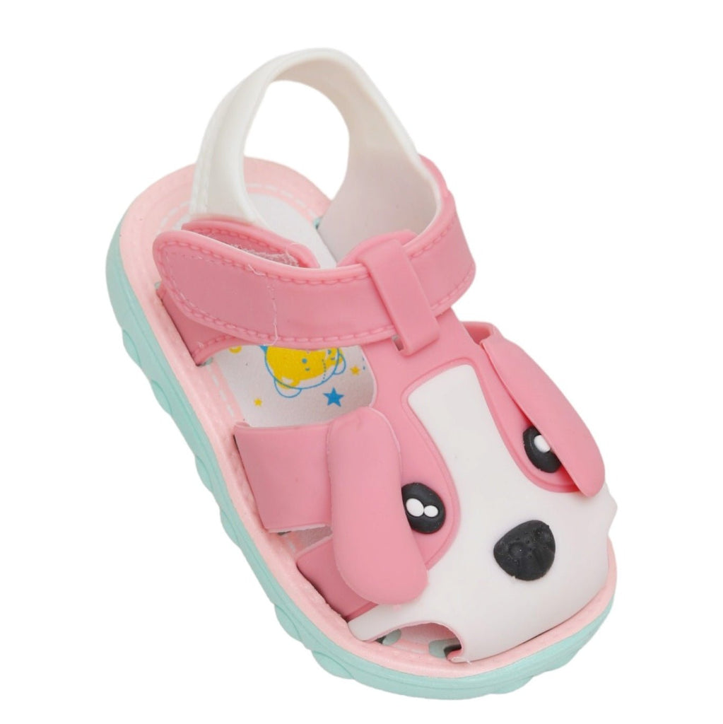 Adorable pink puppy applique toddler sandal, angled side view showcasing the hook and loop strap.