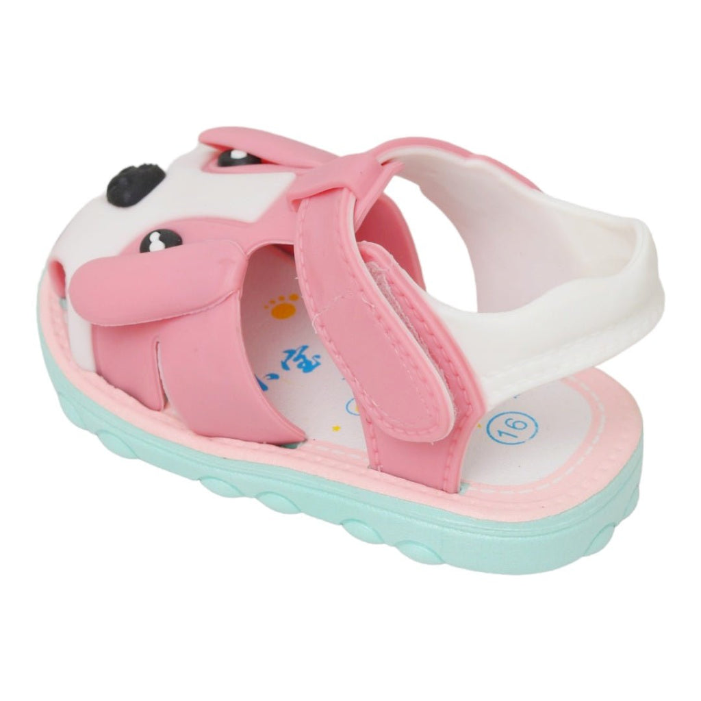 Fun pink toddler sandals with puppy design, three-quarter view showing the sole and strap details.