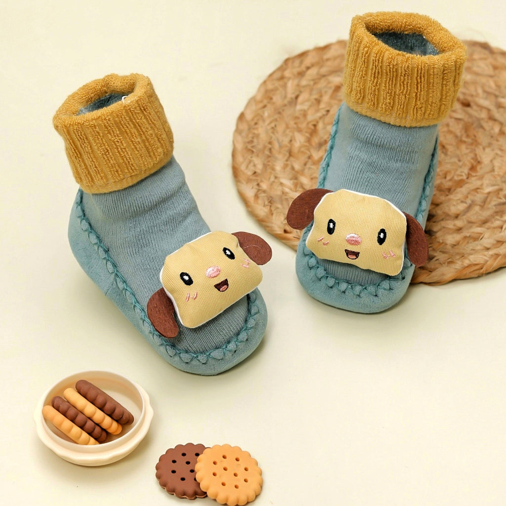 Smiling puppy face stuffed toy socks for infants.