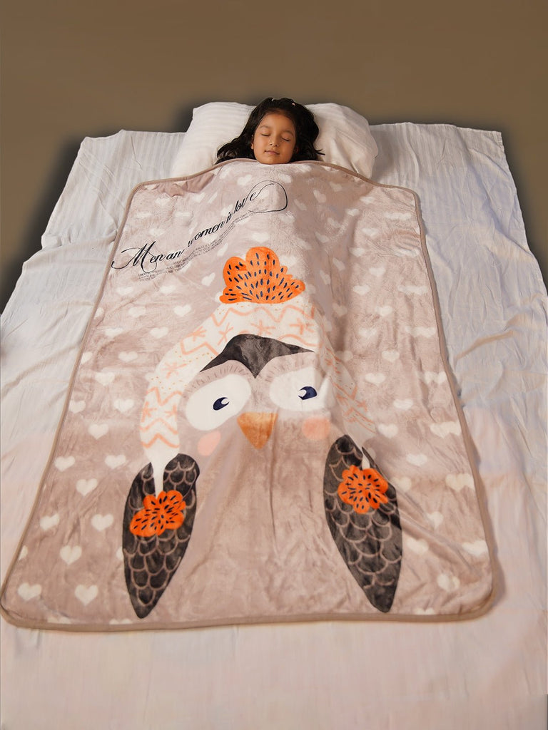 Yellow Bee Owl Blanket laid on bed with girl sleeping - Comforting & Elegant