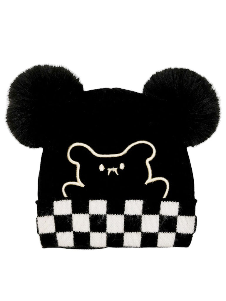 Front view of a boy's black hat featuring a teddy bear design and checkered pattern with pom-poms.
