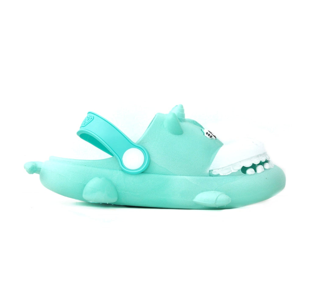 Profile view of aqua hippo toddler clog showcasing its playful design and strap detail.