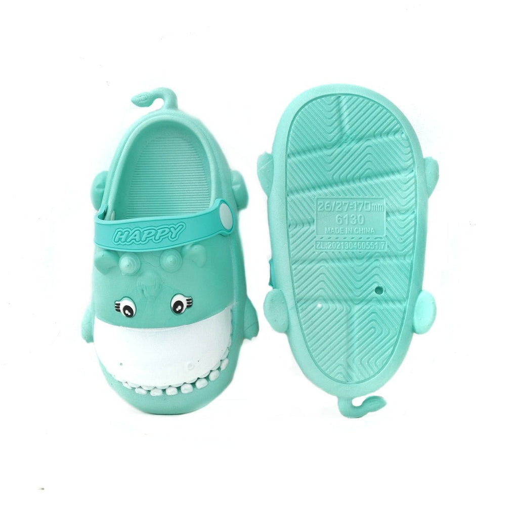 Underneath view of a toddler's aqua hippo clog displaying the non-slip sole pattern