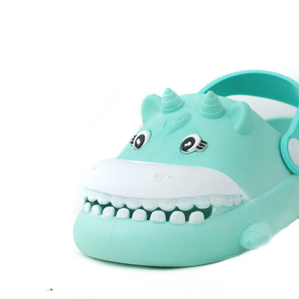 Close-up of the front part of a cheerful aqua hippo toddler clog