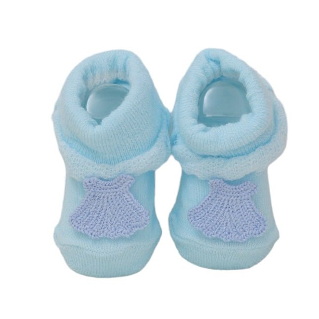 Pair of baby girls' blue socks with lavender shell detail.