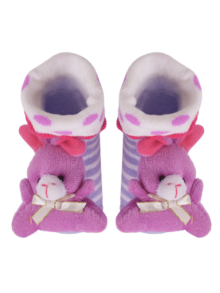 Pair of baby girl's purple leather socks with flower applique and anti-skid sole