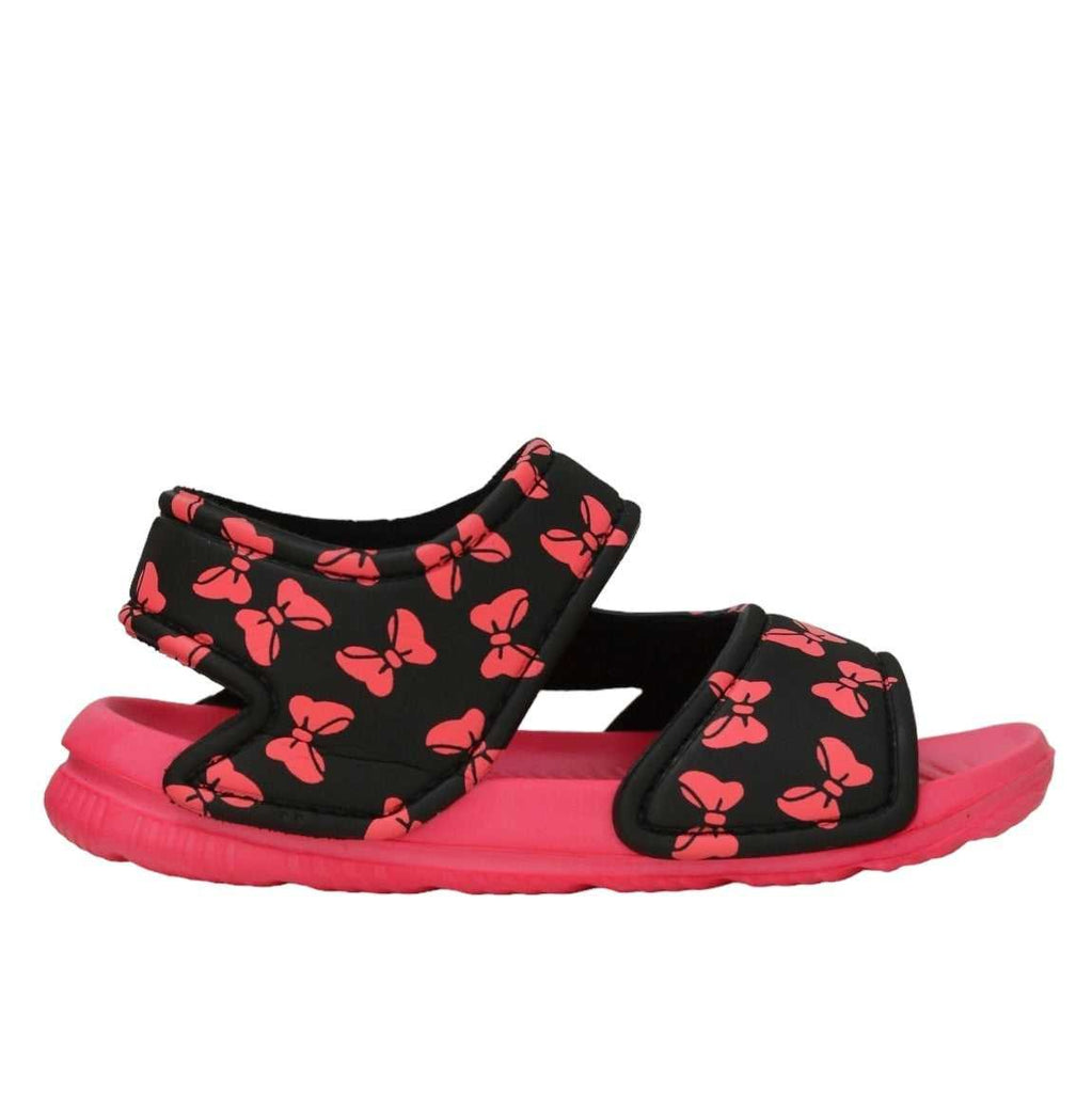 Fashionable children's black sandals with pink bow detailing side view