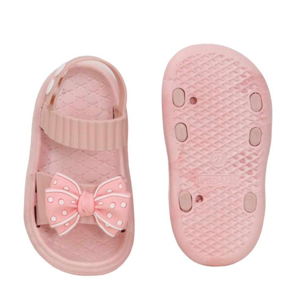 Top and bottom view of the charming pink bow detail sandals, emphasizing the cute design and practicality
