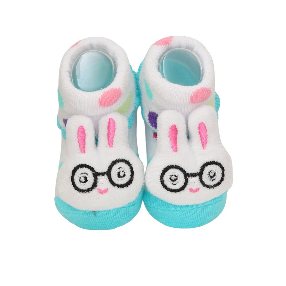 White and turquoise bunny-designed stuffed toy sock for kids with non-slip sole, front and bottom view.
