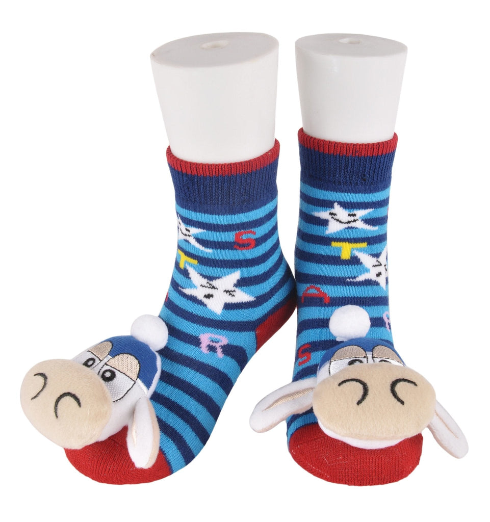 Children's blue striped socks with cow stuffed toy on the toes, side view.
