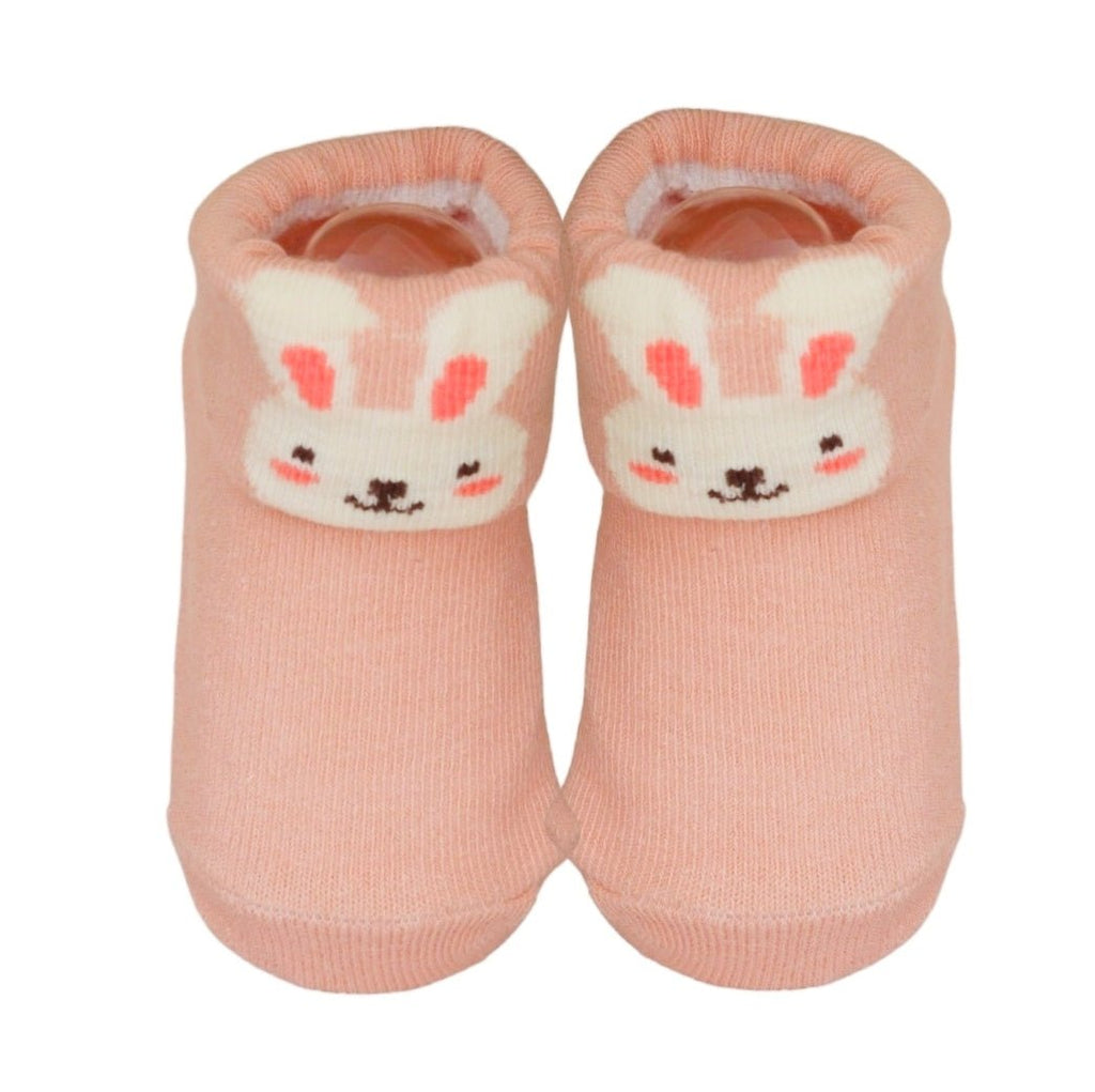 Soft peach bunny baby socks with snug cuffs