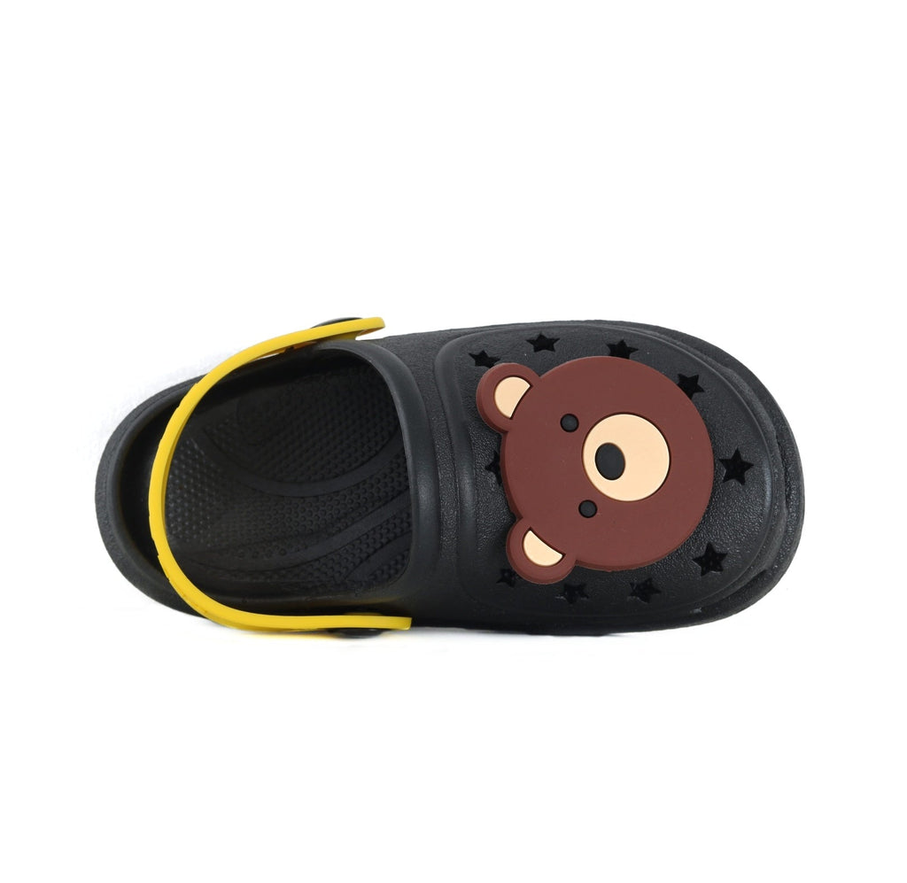 Side profile of black toddler clog with a yellow strap and bear design.