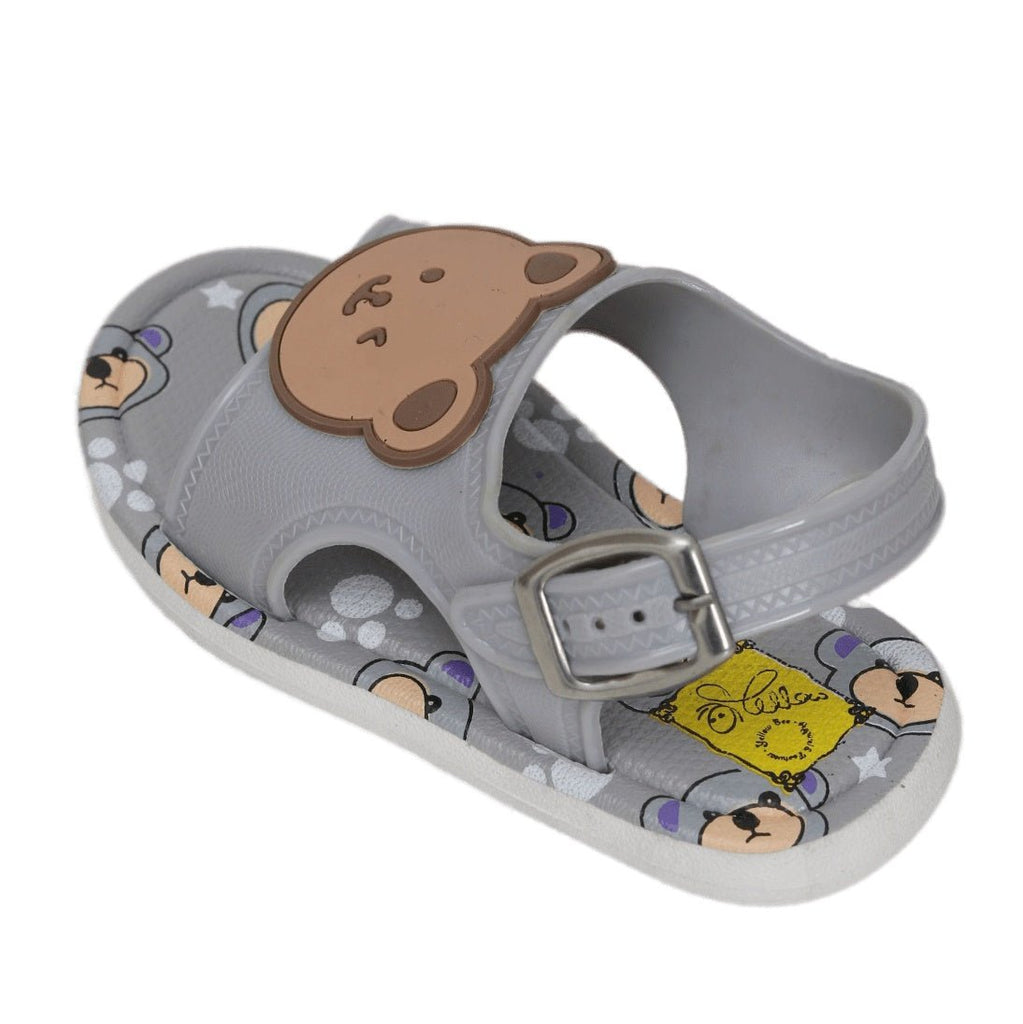 Side view of grey toddler sandals with bear face applique and secure buckle.