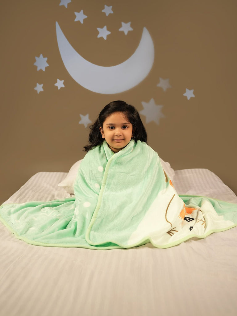 Child Wrapped in Yellow Bee Snowman Blanket with Joyful Winter Design