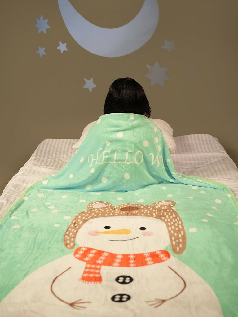 Back View of Boy Covered with Soft Yellow Bee Snowman Blanket