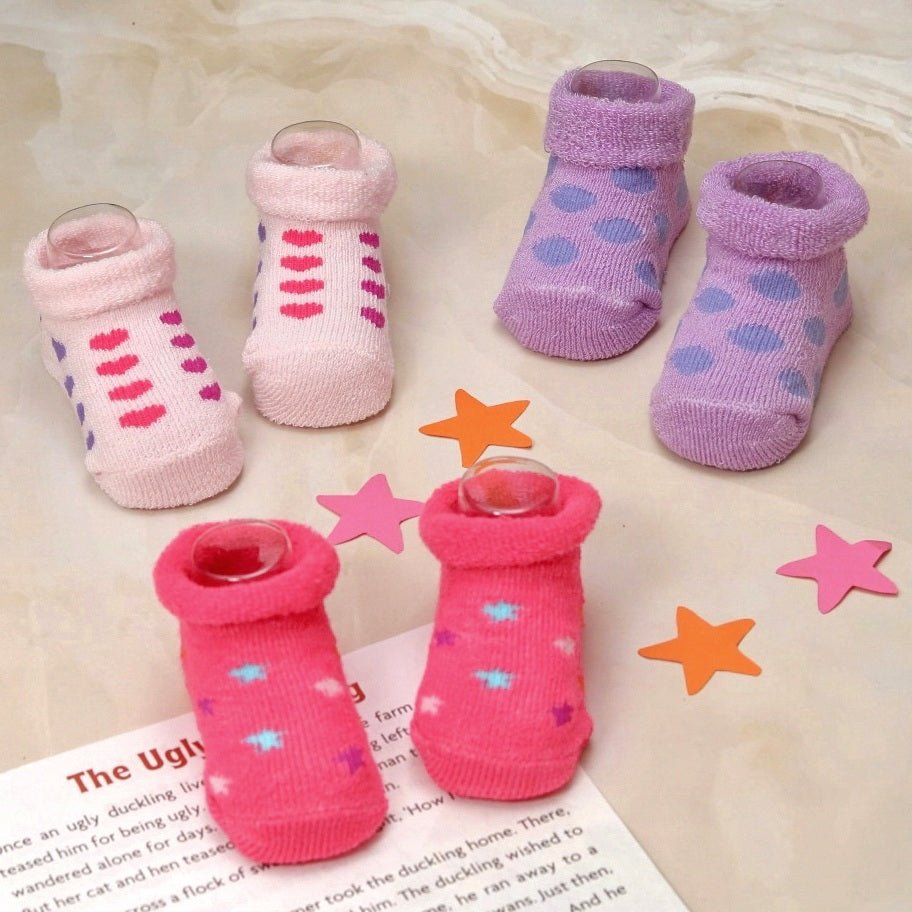 Soft-pink cotton socks with crown ruffle cuff design by Yellow Bee for girls.