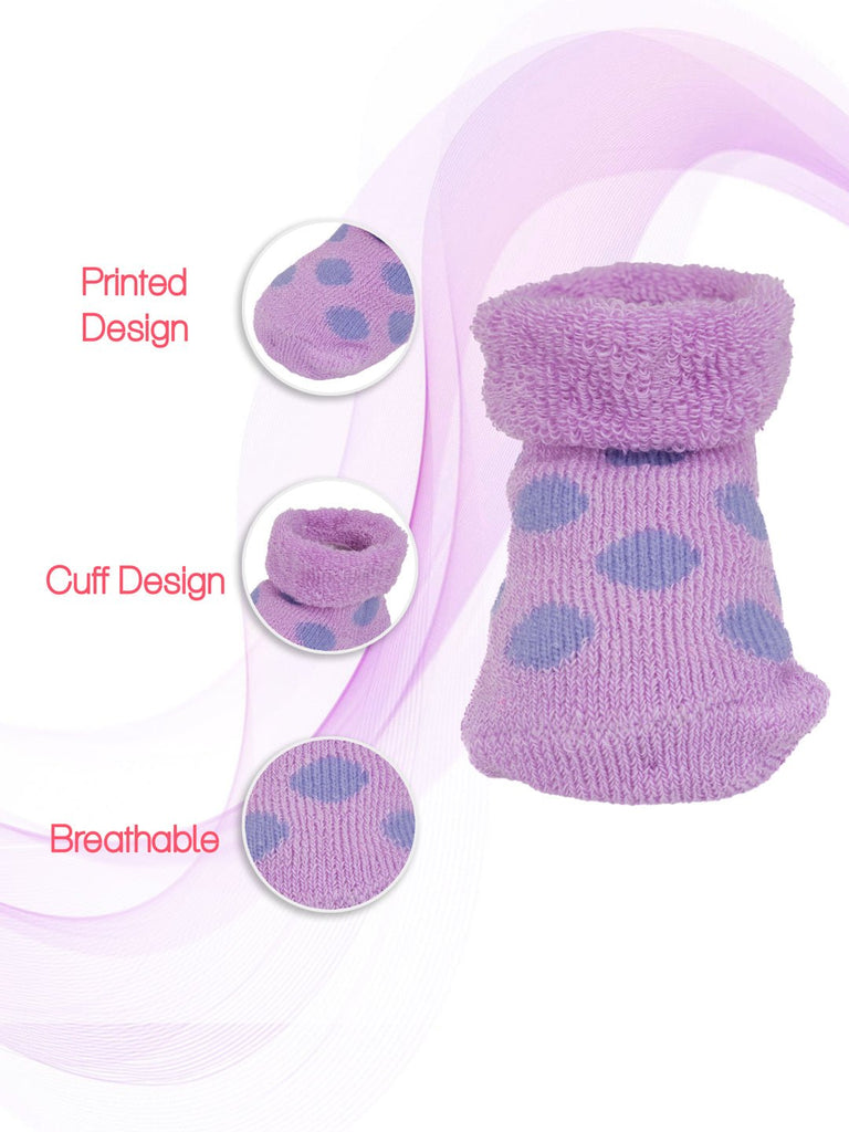 Purple-colored ruffle cuff socks with delicate crown embroidery for toddlers by Yellow Bee.