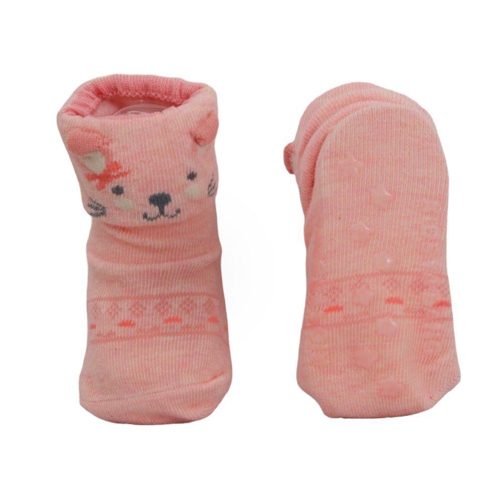 Sole view of pink cat baby socks, highlighting the anti-slip pattern.