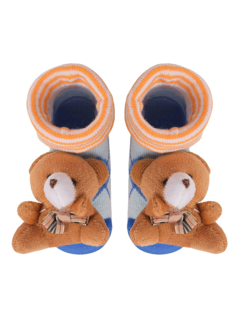 Top view of cozy Bear Stuffed Toy Socks for infants with plush bear detail.