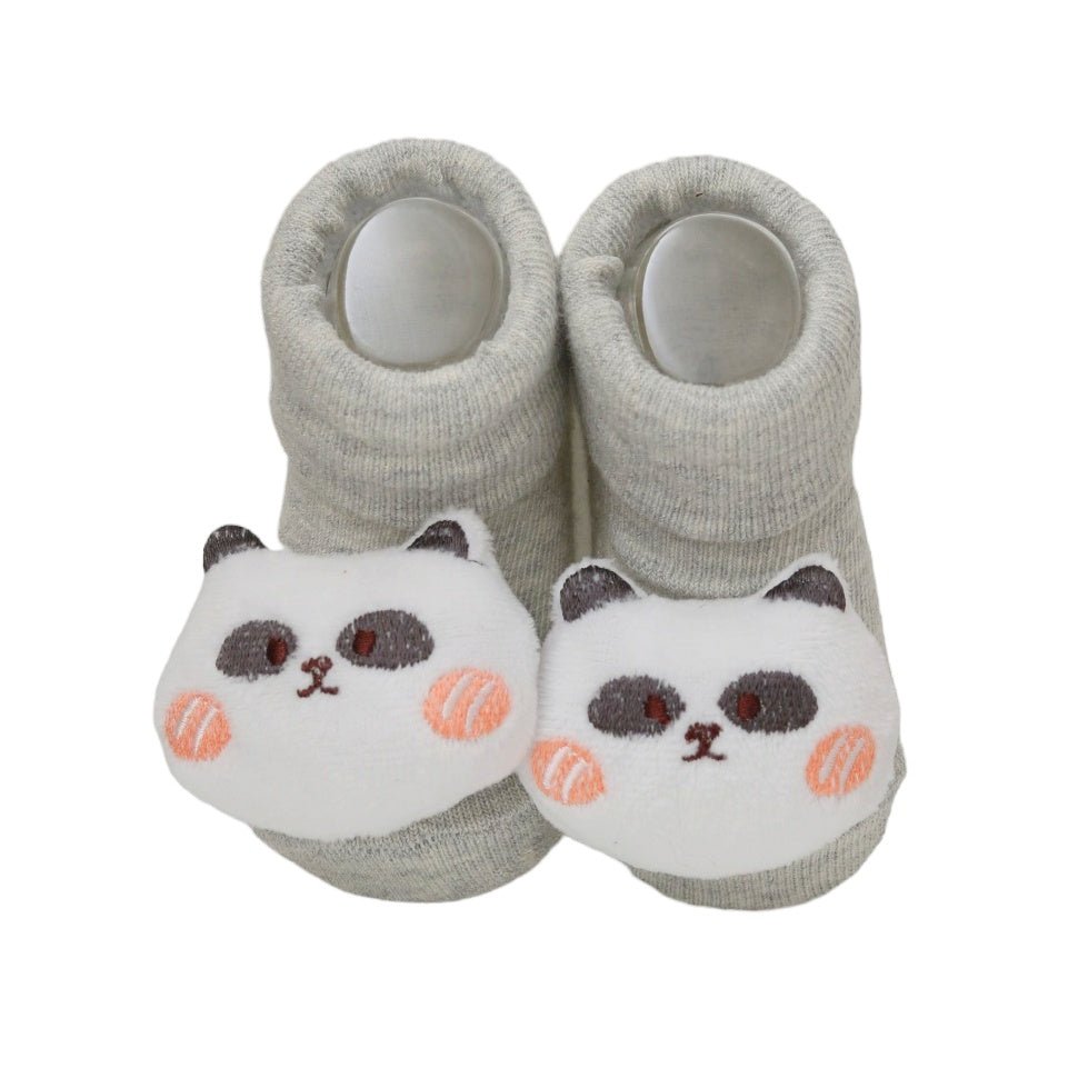 Pair of bear-themed stuffed toy socks for babies