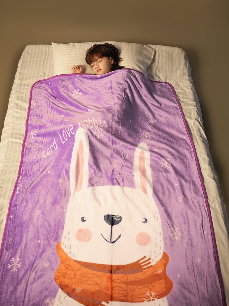 Back View of Yellow Bee Flannel Rabbit Blanket Draped Over Bed