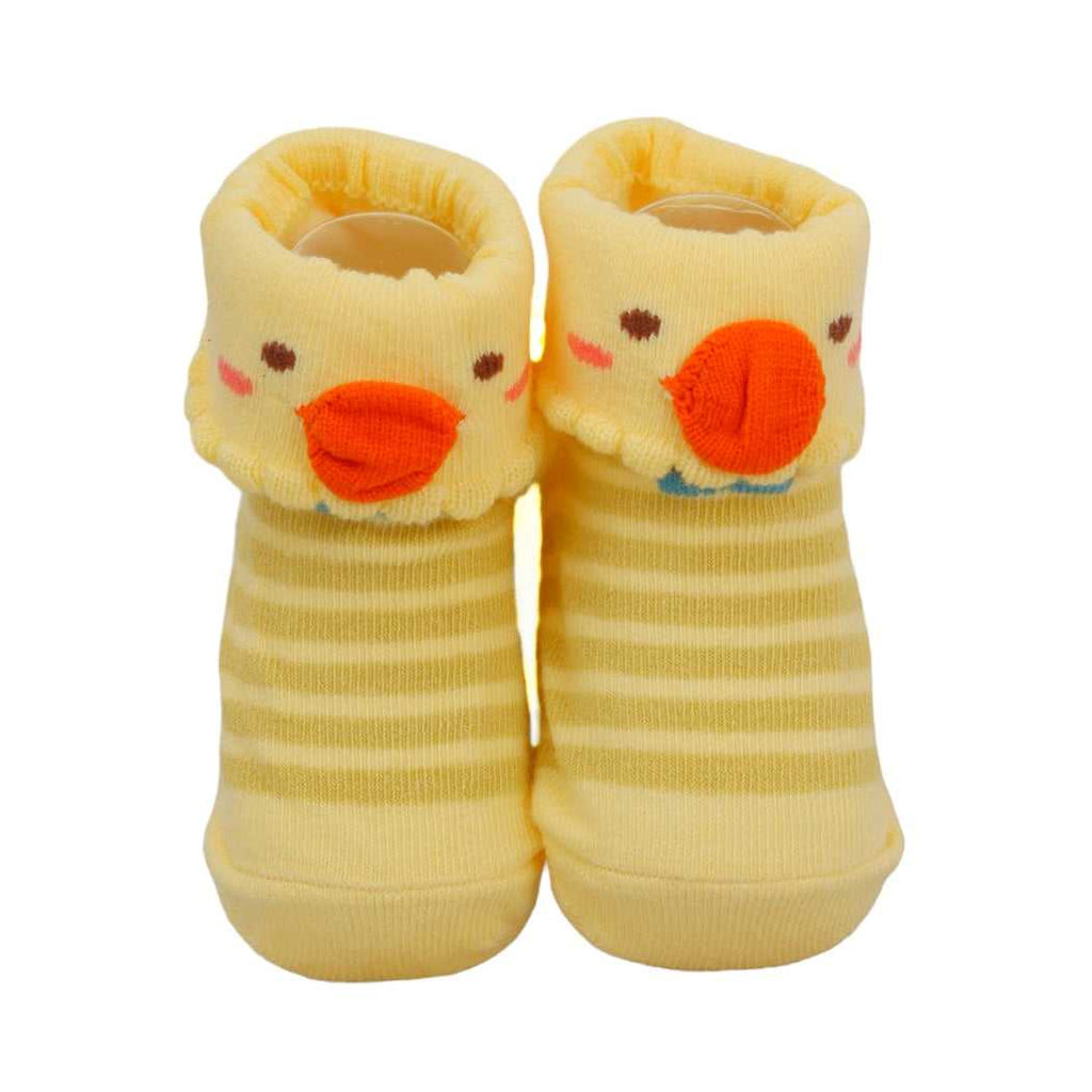 Yellow and white striped baby girl socks with a playful duck face and orange beak on the cuffs.