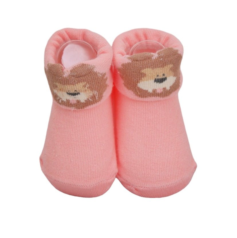 Adorable pink socks with bear and unicorn designs for baby girls