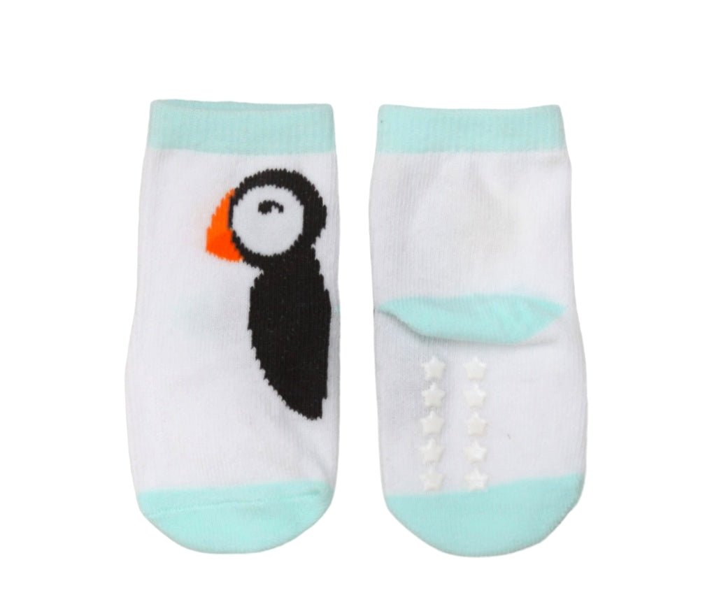Close-up of bear-themed socks for baby boys