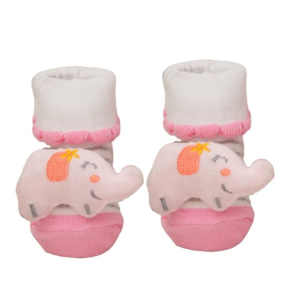 Soft pink elephant stuffed toy socks by Yellow Bee, showcasing the playful design and plush texture.