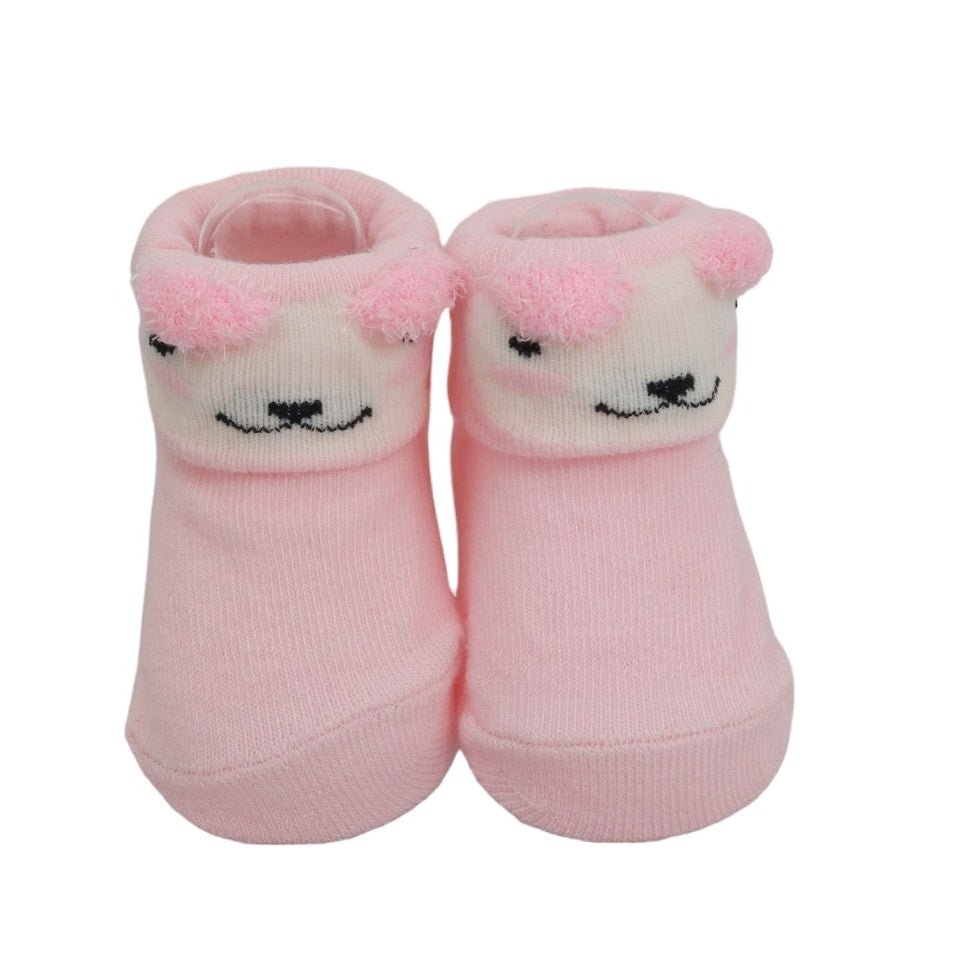 Cute baby girl pink puppy socks set viewed from the front
