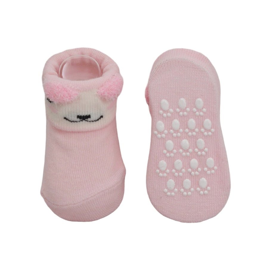 Non-slip baby girl pink puppy socks set viewed from the bottom