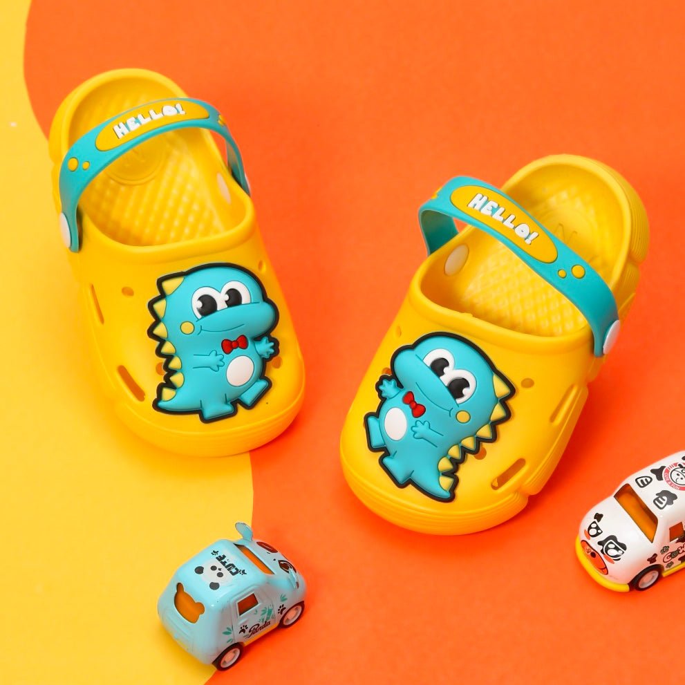 Yellow Bee versatile clogs that transform from slides to sandals with a cute dinosaur motif.
