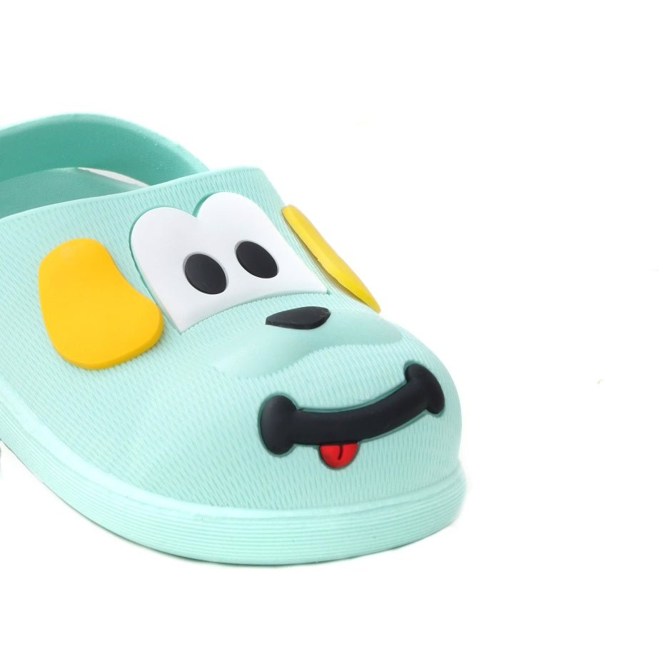 Close-up of the puppy face on the boys' clogs, highlighting the joyful expression.