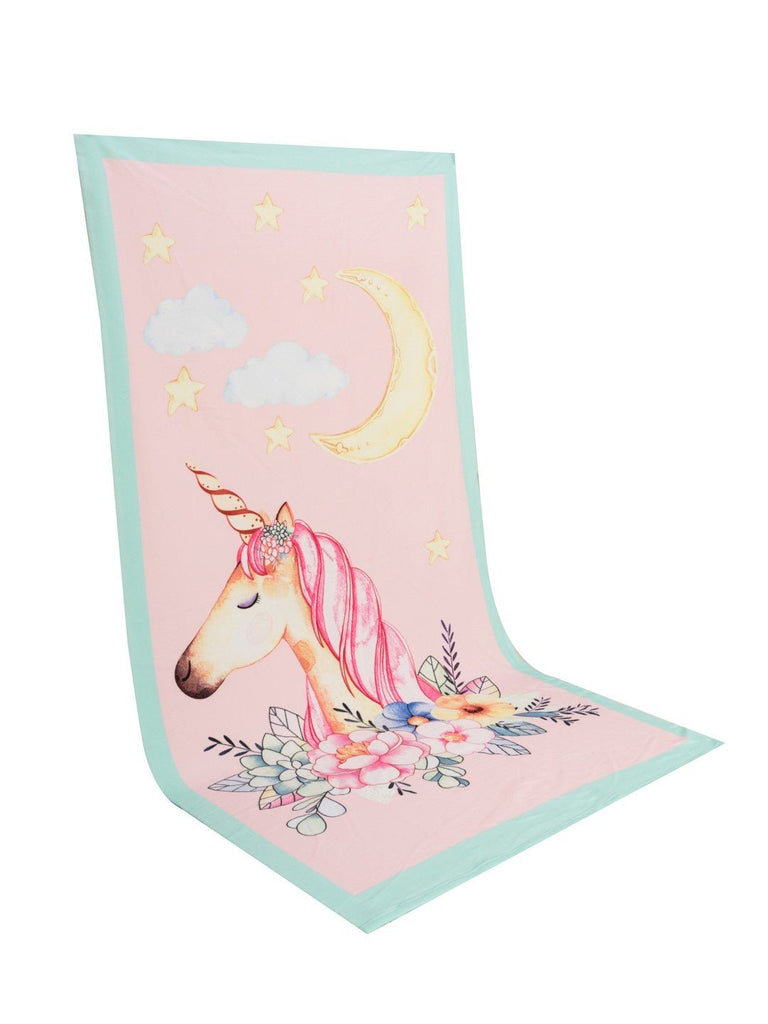 Full view of Yellow Bee's unicorn-themed towel with stars, moon, and clouds pattern.